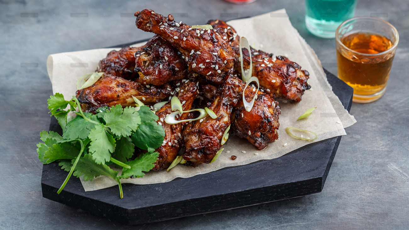 demo-attachment-399-baked-chicken-wings-with-sesame-and-sauce-food-MFRKAYT-copy